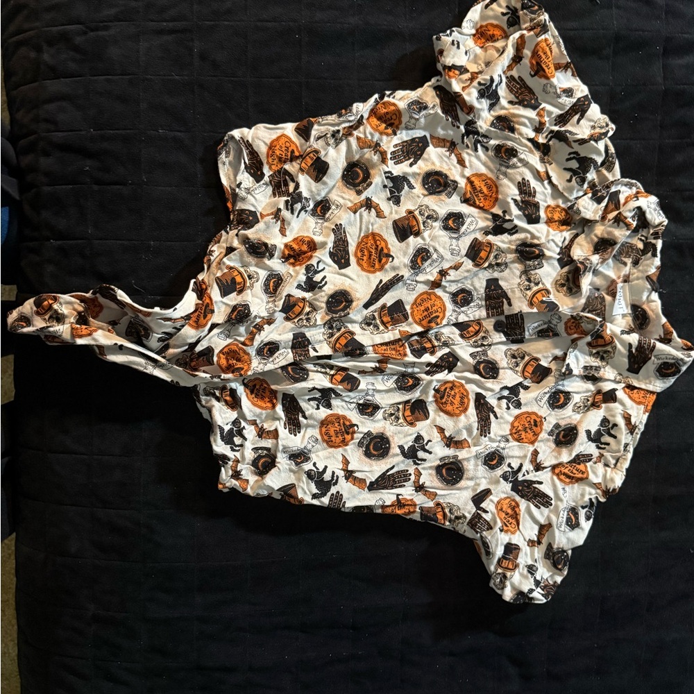 Spirit Halloween Shirt with Orange and Black Design